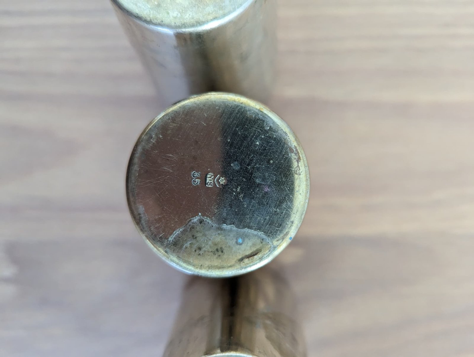 Close up of silver jewelry showing the official BIS hallmark for purity verification