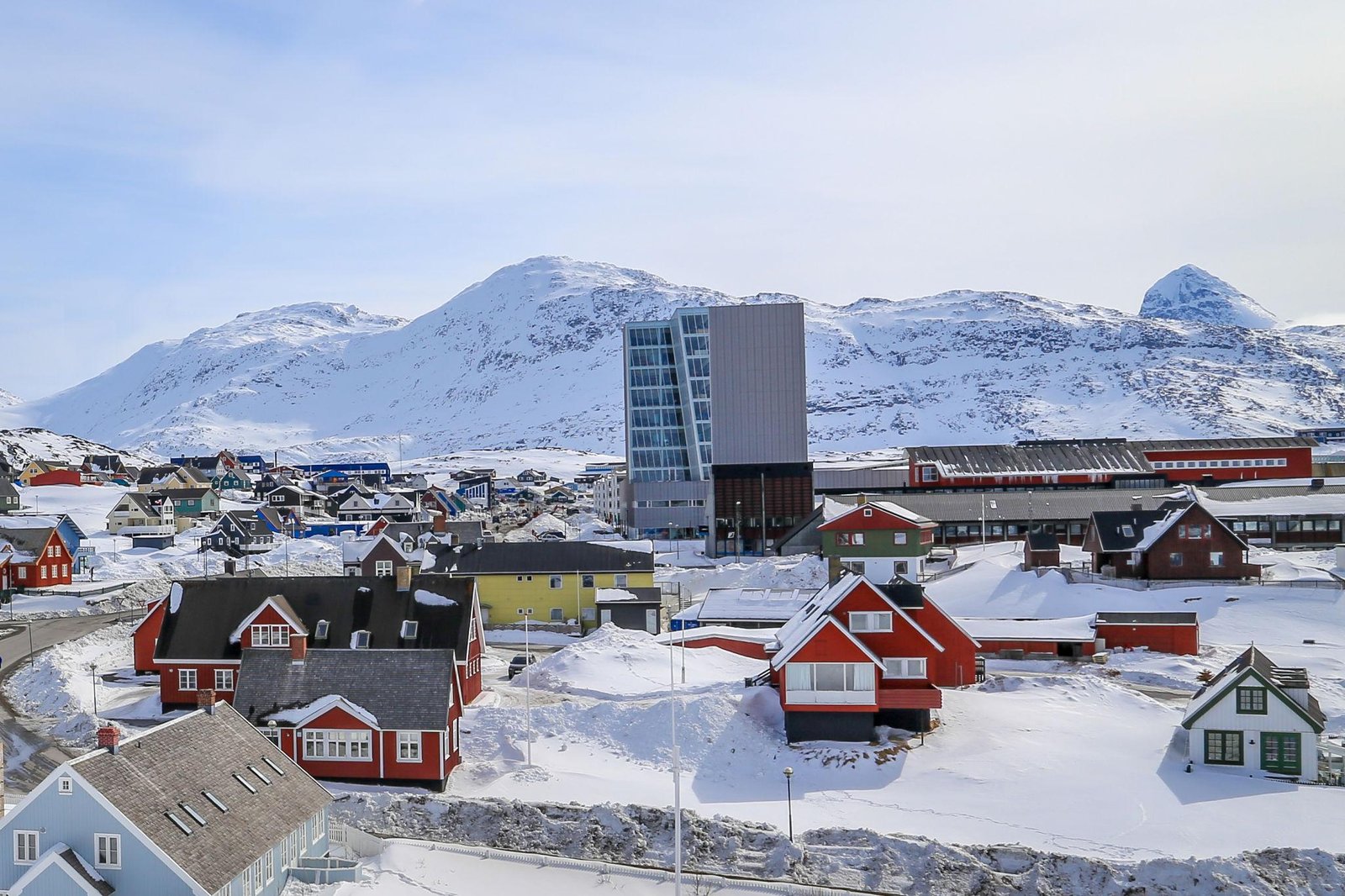 Traditional dog sledding across the frozen tundra of Greenland