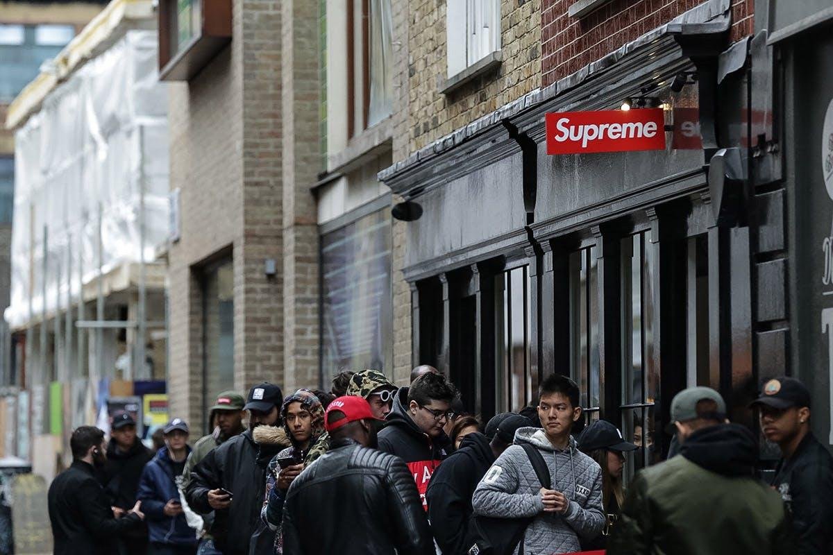 Supreme Maison Margiela collaboration aesthetic showing high-fashion streetwear elements