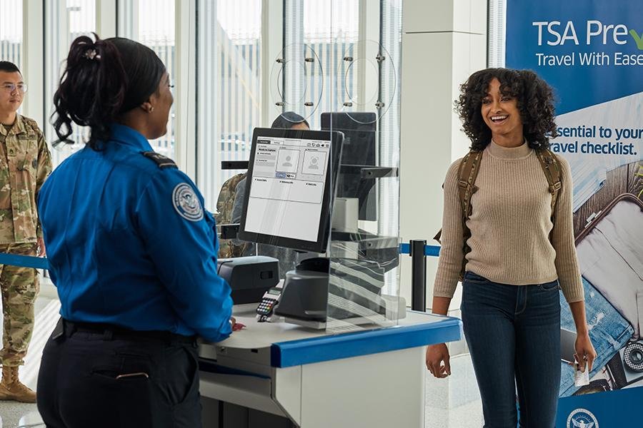 Carry-on luggage passing through security with electronics remaining inside