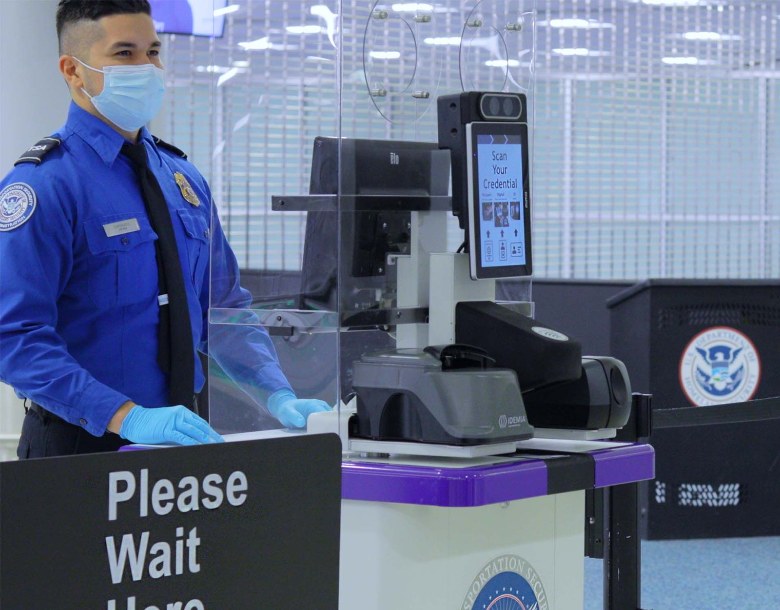 TSA PreCheck expedited security lane at a busy airport