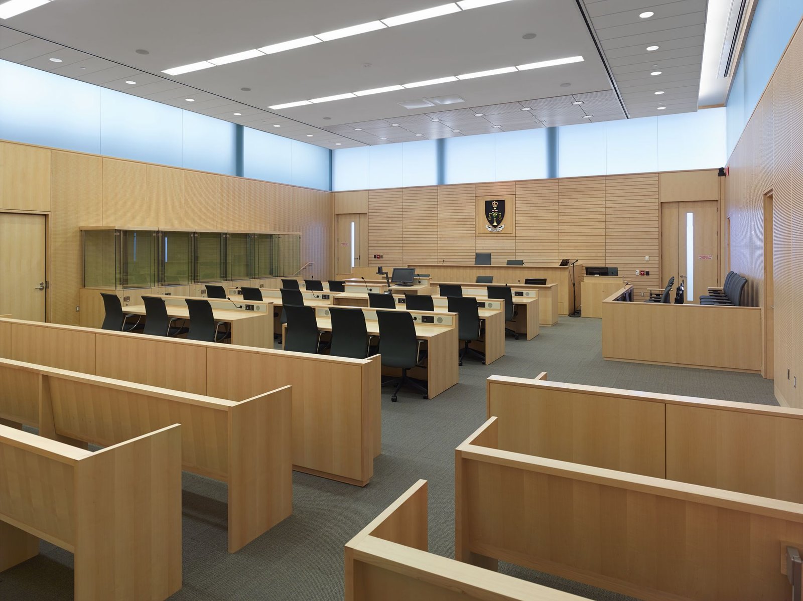 Empty high security courtroom symbolizing international legal efforts