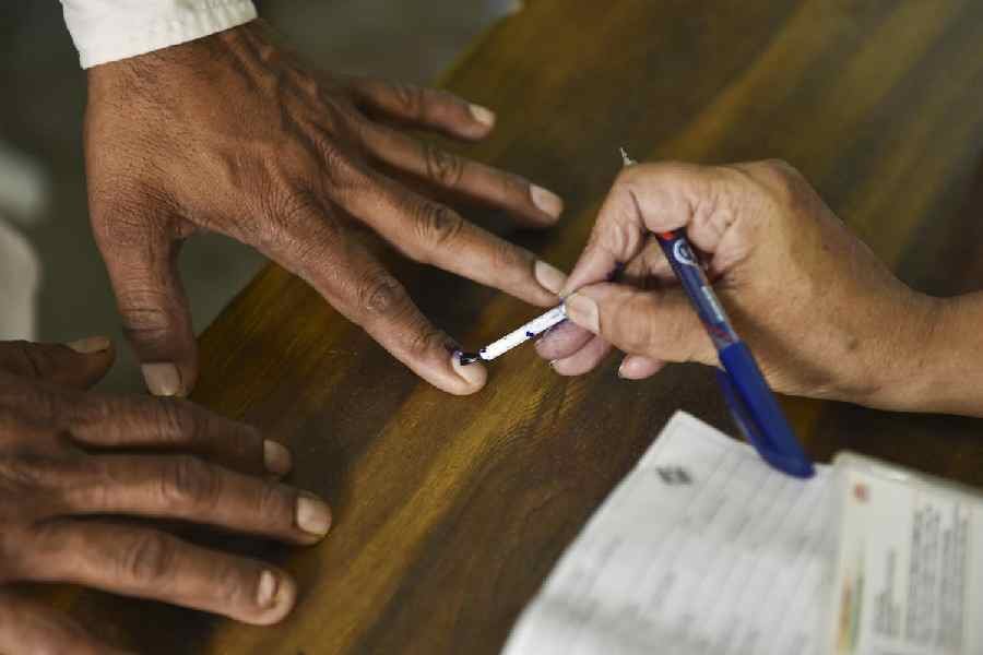 Election officials during the counting process of Rajya Sabha polls