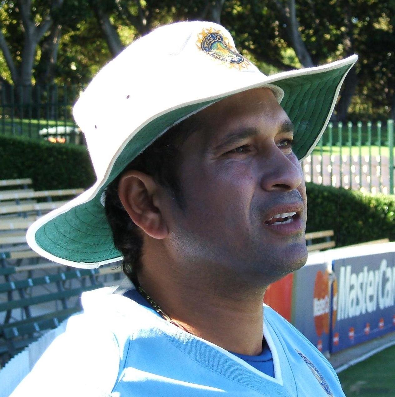 Cricket batsman hitting shot