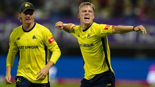 Nathan Ellis delivering a fast ball in a T20 match