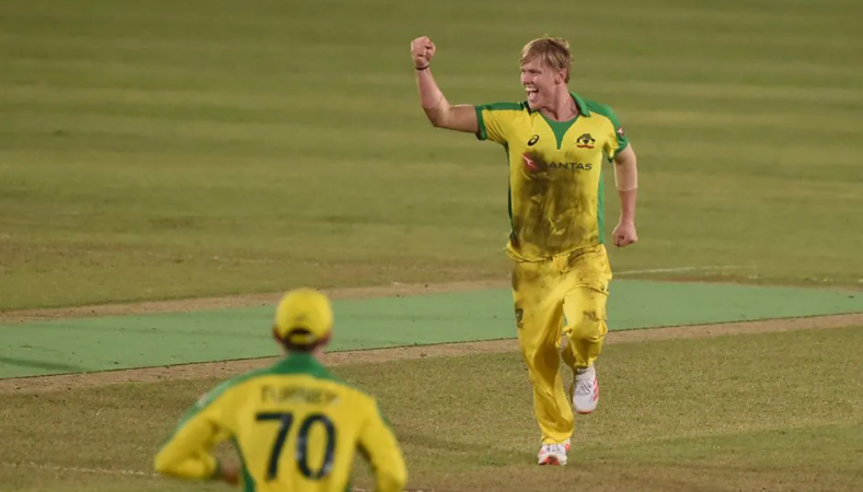 Nathan Ellis celebrating a wicket in an IPL jersey