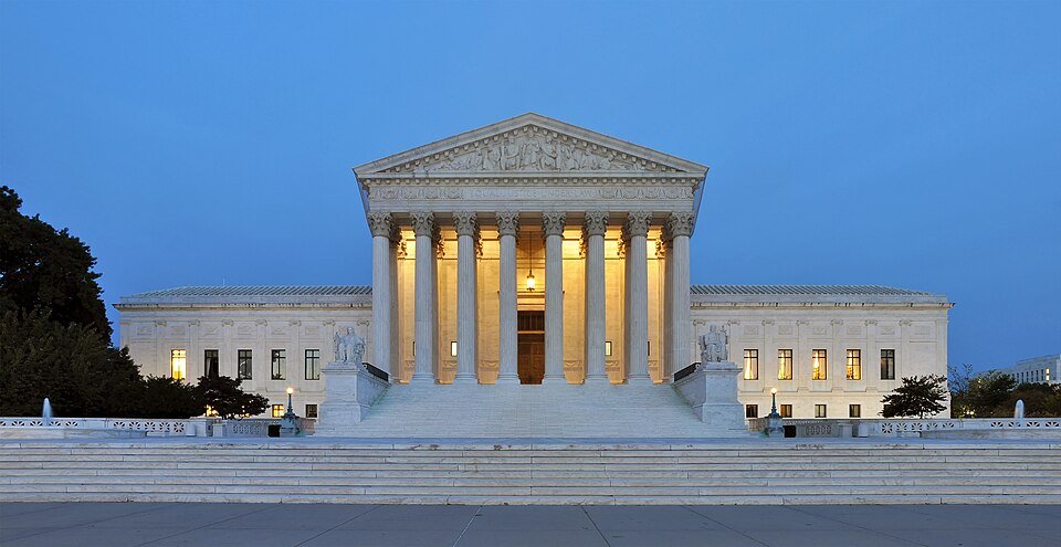 The Supreme Court of the United States building representing judicial authority.