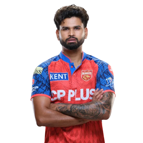 Shreyas Iyer playing a signature lofted shot against a spinner