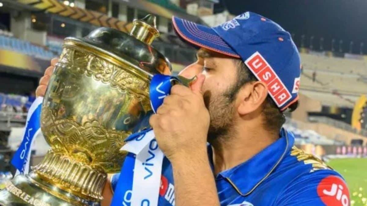 Rohit Sharma lifting the IPL trophy as Mumbai Indians captain