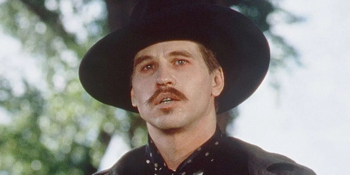 Val Kilmer as the iconic character Doc Holliday in a western setting