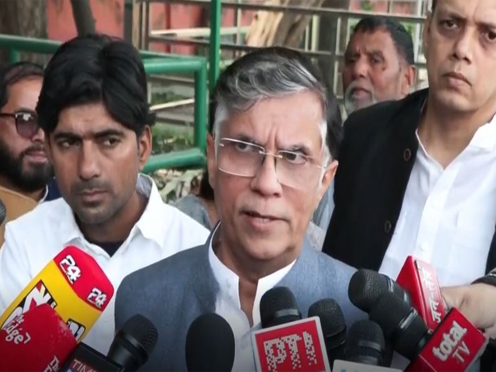 Pawan Khera working with the Congress media team