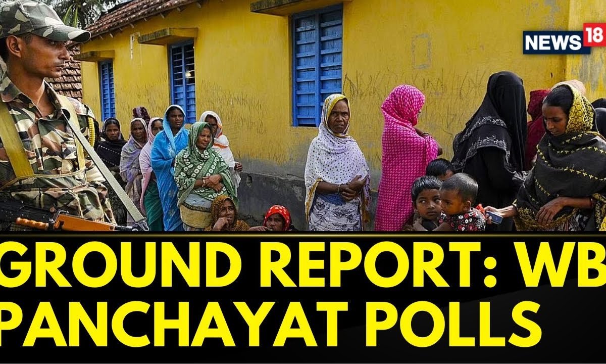 Voters standing in line at a polling station in West Bengal